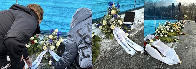 Frau Engelmeier und andere Beteiligte bei der Kranzniederlegung am Gedenkort